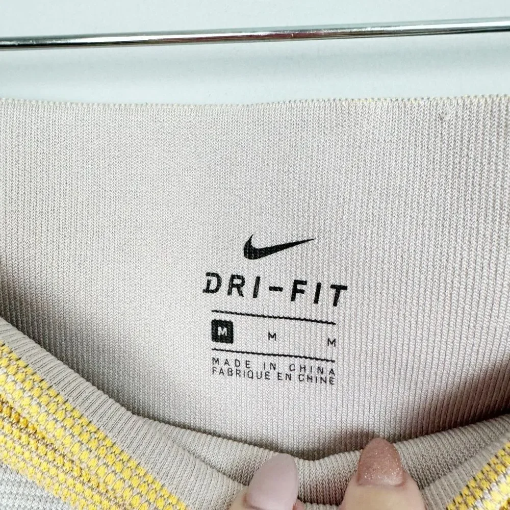 NIKE | Dri Fit Sculpt Icon Clash Cropped Leggings Yellow Gray Tan Women’s Size M